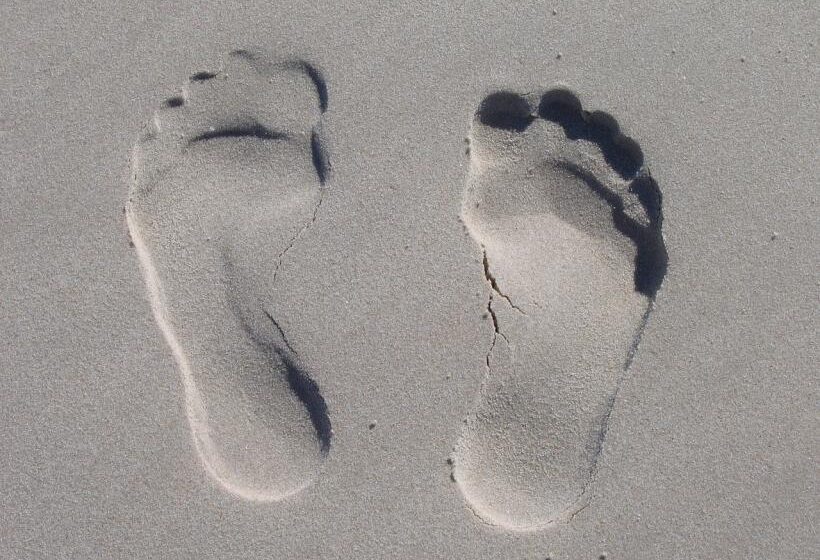 Barfuß Abdruck im Strand