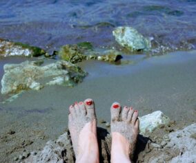 Füße am Strand